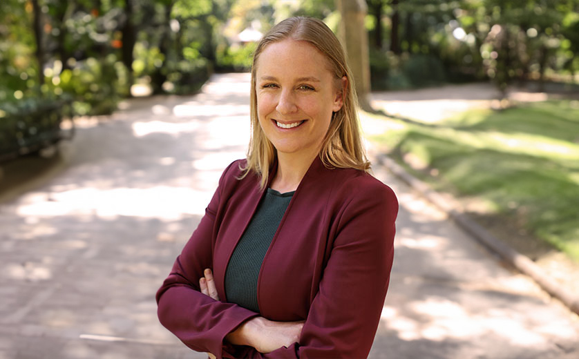 Portrait photograph of Morgan Shields standing outside on a sunny day